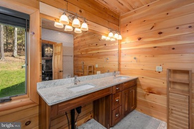 Stunning lakefront log home offering the perfect blend of rustic - photo 37