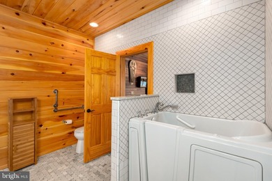 Stunning lakefront log home offering the perfect blend of rustic - photo 41