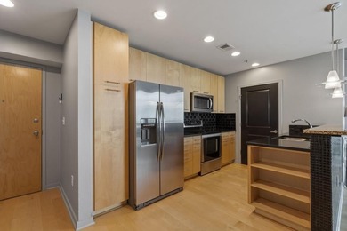 Experience upscale city living in this stunningly maintained