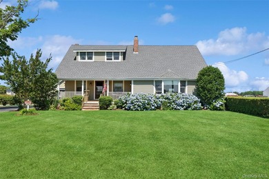 Nestled along picturesque Oregon Road, one of Cutchogue's most - photo 1