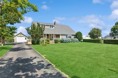 Nestled along picturesque Oregon Road, one of Cutchogue's most - photo 3