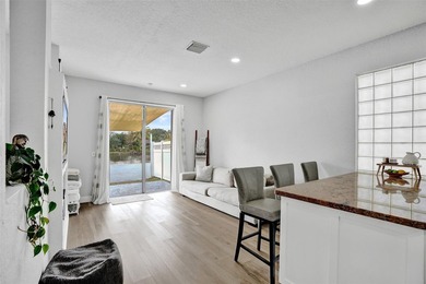 This beautifully updated 4BR/2.5BA waterfront home offers serene - photo 11