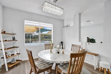 This beautifully updated 4BR/2.5BA waterfront home offers serene - photo 13