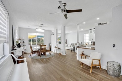 This beautifully updated 4BR/2.5BA waterfront home offers serene - photo 17