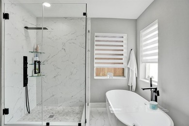This beautifully updated 4BR/2.5BA waterfront home offers serene - photo 20