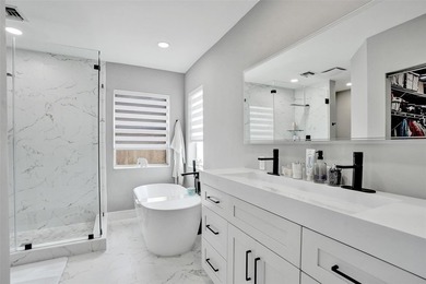 This beautifully updated 4BR/2.5BA waterfront home offers serene - photo 22