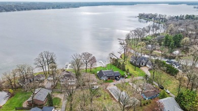 Enjoy the Gull Lake lifestyle with 70' of lake access and shared - photo 3