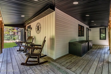 Tucked away on over an acre of private land, this beautifully - photo 4