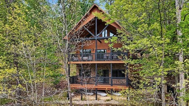 An exceptional opportunity to own a custom Jubach log cabin on - photo 5