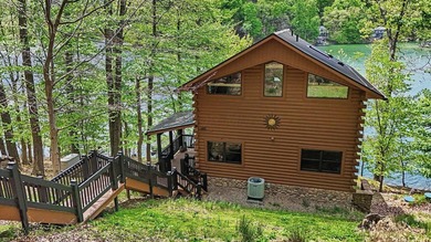An exceptional opportunity to own a custom Jubach log cabin on - photo 6