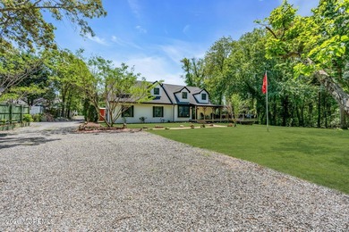 Tucked away on over an acre of private land, this beautifully - photo 7