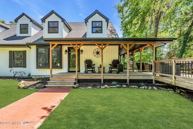 Tucked away on over an acre of private land, this beautifully - photo 8