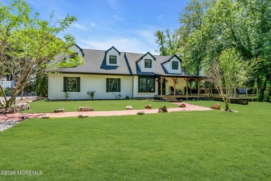 Tucked away on over an acre of private land, this beautifully - photo 9
