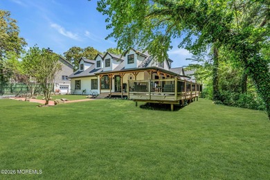 Tucked away on over an acre of private land, this beautifully - photo 10
