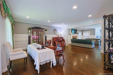 Located in the prestigious Village of Roslyn Harbor, this - photo 11