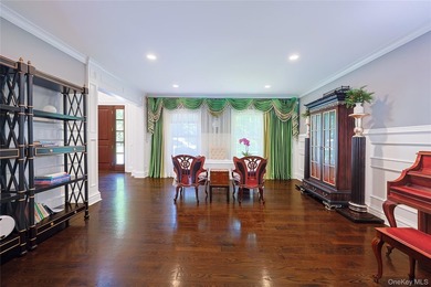 Located in the prestigious Village of Roslyn Harbor, this - photo 13