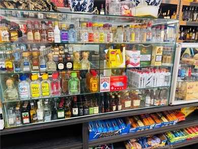 PRICE IMPROVEMENT! RECENTLY UPDATED LIQUOR STORE, IN A VERY BUSY - photo 3