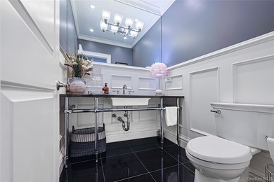 Located in the prestigious Village of Roslyn Harbor, this - photo 24