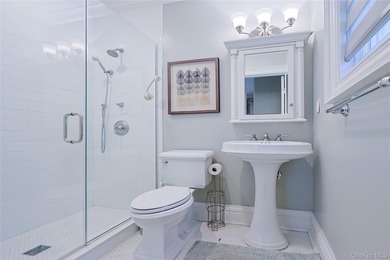 Located in the prestigious Village of Roslyn Harbor, this - photo 26