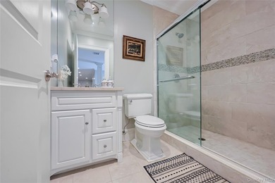 Located in the prestigious Village of Roslyn Harbor, this - photo 27