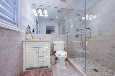Located in the prestigious Village of Roslyn Harbor, this - photo 29
