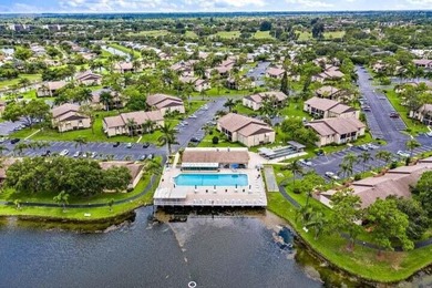 Welcome to this charming 55+ two-story condo located on the - photo 2