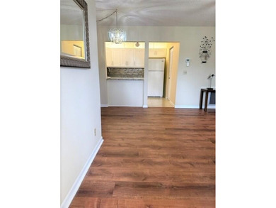 Welcome to this charming 55+ two-story condo located on the - photo 8