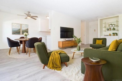 Step into this refreshed, sunlit 2-bedroom, 2-bath condo in the - photo 1