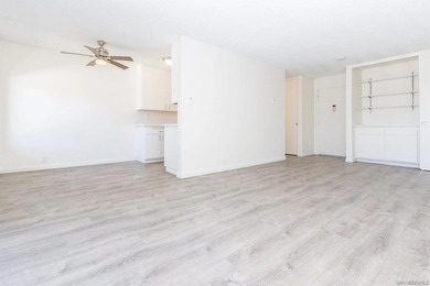Step into this refreshed, sunlit 2-bedroom, 2-bath condo in the - photo 2