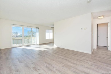 Step into this refreshed, sunlit 2-bedroom, 2-bath condo in the - photo 3