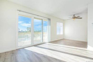 Step into this refreshed, sunlit 2-bedroom, 2-bath condo in the - photo 4