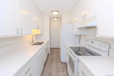 Step into this refreshed, sunlit 2-bedroom, 2-bath condo in the - photo 6