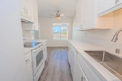 Step into this refreshed, sunlit 2-bedroom, 2-bath condo in the - photo 8