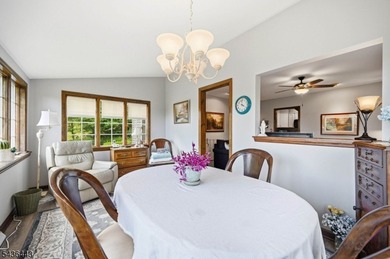 Perched on a corner lot in Pinecliff Lake Community, this - photo 12