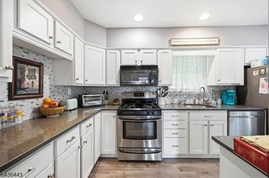 Perched on a corner lot in Pinecliff Lake Community, this - photo 13