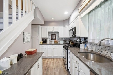 Perched on a corner lot in Pinecliff Lake Community, this - photo 14