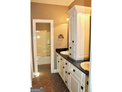 Located in The Cloisters, this 5 bedroom, 3.5 bath home is - photo 15