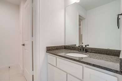 Nestled in a prime location just steps from the serene shores of - photo 29