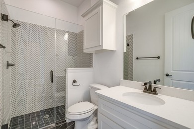Nestled in a prime location just steps from the serene shores of - photo 38