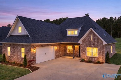 Located on the golf course in Cherokee Ridge, this move-in ready - photo 1