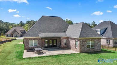 Located on the golf course in Cherokee Ridge, this move-in ready - photo 3