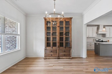 Located on the golf course in Cherokee Ridge, this move-in ready - photo 6