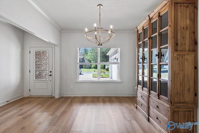 Located on the golf course in Cherokee Ridge, this move-in ready - photo 7