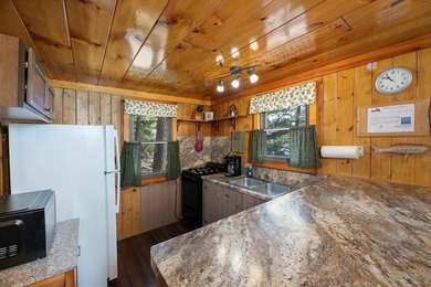 Situated on the crystal-clear shores of the stunning 1060-acre - photo 12