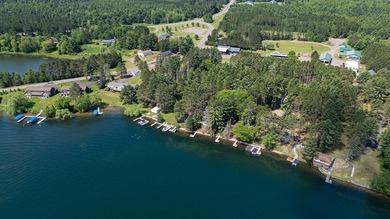 Situated on the crystal-clear shores of the stunning 1060-acre - photo 22