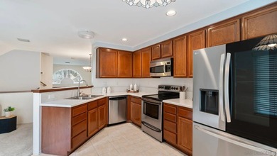 Welcome to this spacious 3-bedroom, 2.5-bath townhome nestled in - photo 3