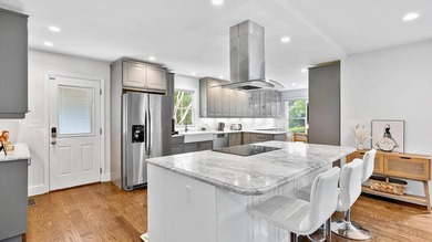 Experience the perfect blend of modern style and coastal - photo 9