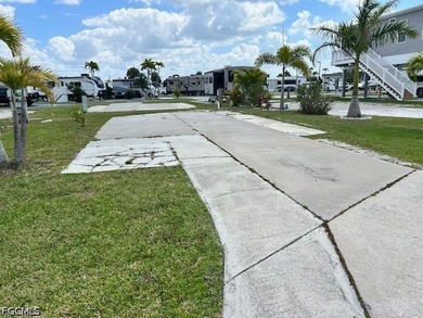 Vacant lot with a concrete slab, electric, and sewer already in - photo 3