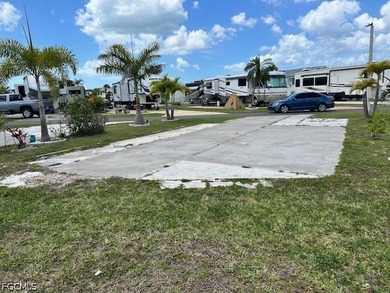 Vacant lot with a concrete slab, electric, and sewer already in - photo 4