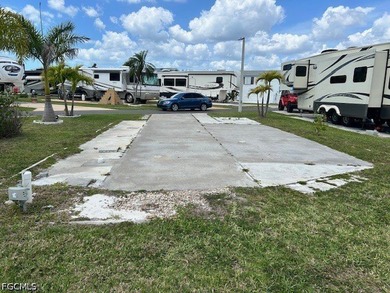 Vacant lot with a concrete slab, electric, and sewer already in - photo 5